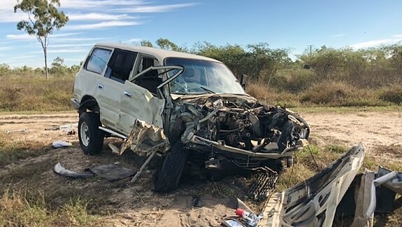 A badly damaged 4WD following a head-on collision with another vehicle.