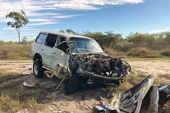 A badly damaged 4WD following a head-on collision with another vehicle.