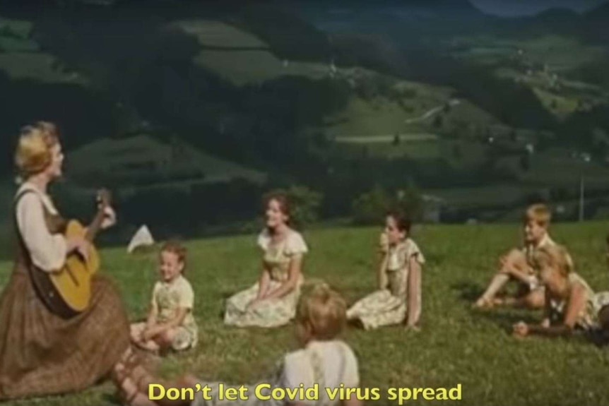 A screengrab from the 1965 musical The Sound of Musical showing a woman singing to a group of children in the Austrian alps.