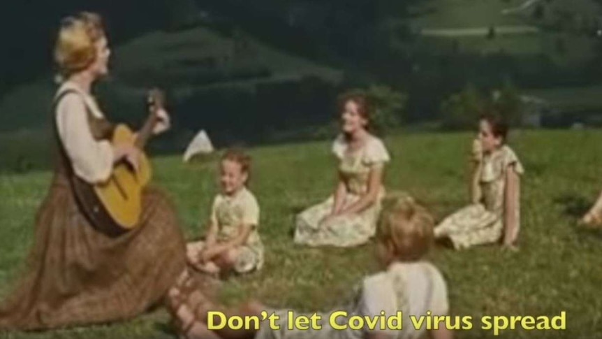 A screengrab from the 1965 musical The Sound of Musical showing a woman singing to a group of children in the Austrian alps.