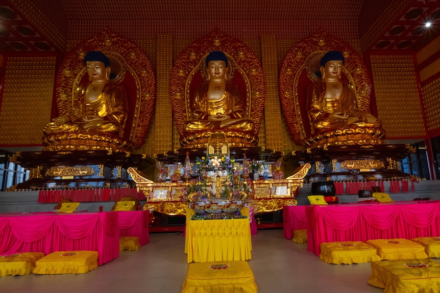 A photo of Buddhist statues.