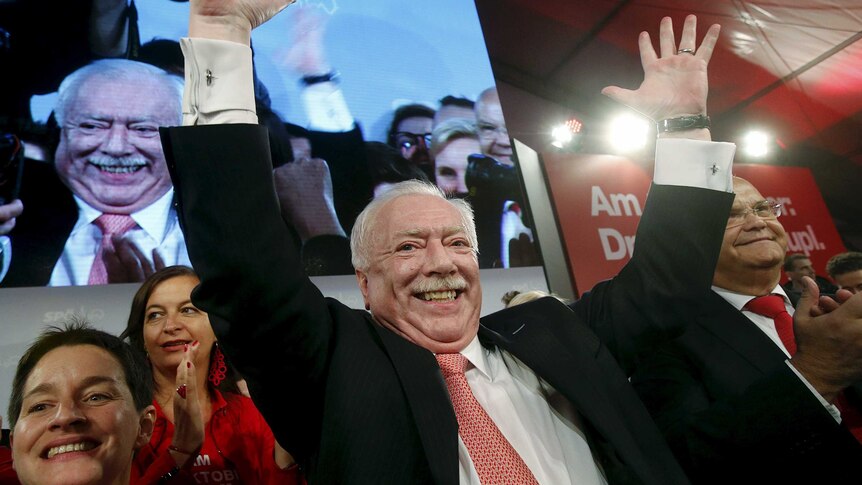 Michael Haeupl celebrates his election win in Vienna