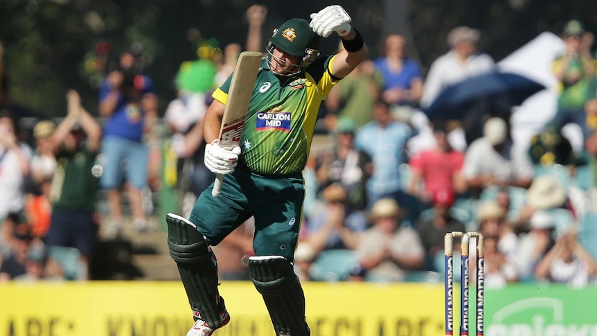 Australia's Aaron Finch celebrates a century in game three of the ODI series against South Africa.
