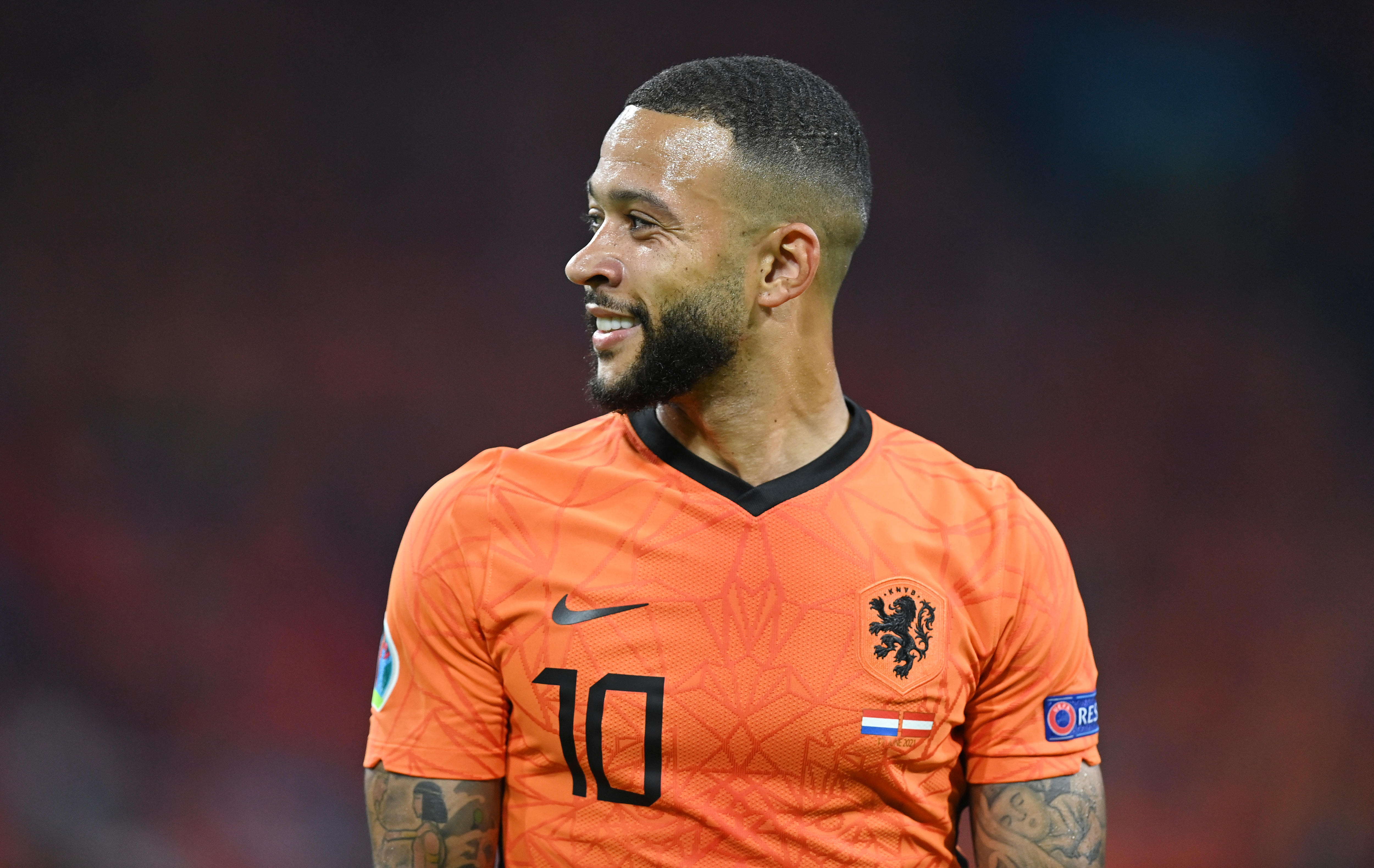 Mephis Depay smiles