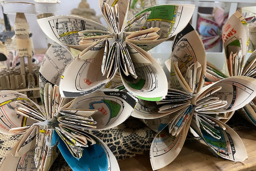 Paper flowers made from street directories
