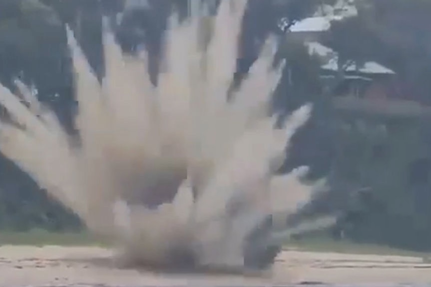 Screengrab of an explosion on a beach