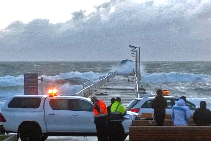 Waves crash over Henley Jetty