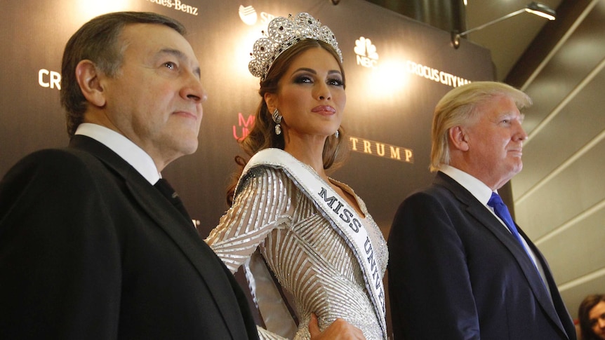 Donald Trump stands alongside Miss Universe 2013 Gabriela Isler and businessman Aras Agalarov