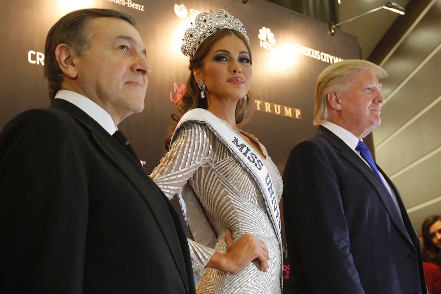 Donald Trump stands alongside Miss Universe 2013 Gabriela Isler and businessman Aras Agalarov