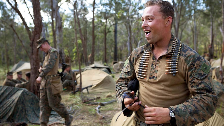 A US marine keeps his ammunition in easy reach