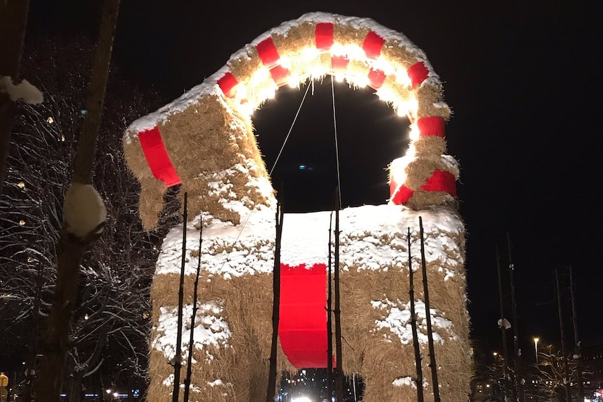 The Gavle Goat stands at night