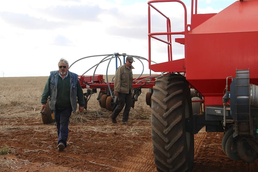 Neville and Tom Michael on a farm.