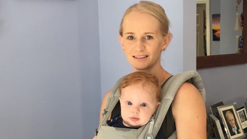 Kirsty McDonald with son Leni in a baby carrier