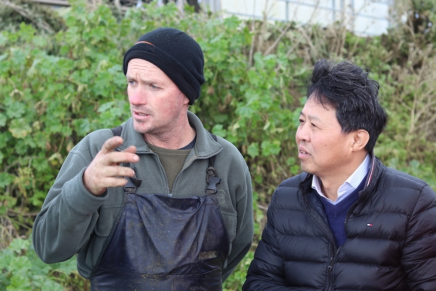 Mr Lu with farm manager Bevan Gould.
