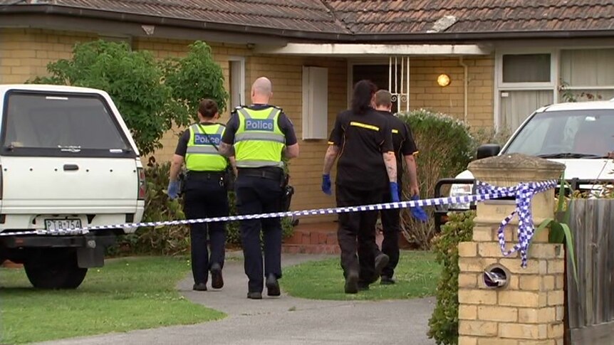 Police at the house on Vincent Street in Mulgrave where a man was shot dead.