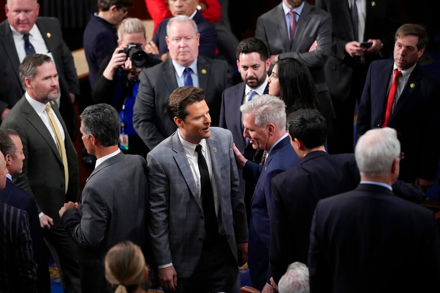 Rep. Kevin McCarthy, R-Calif., talks with Rep. Matt Gaetz, R-Fla., during voting.