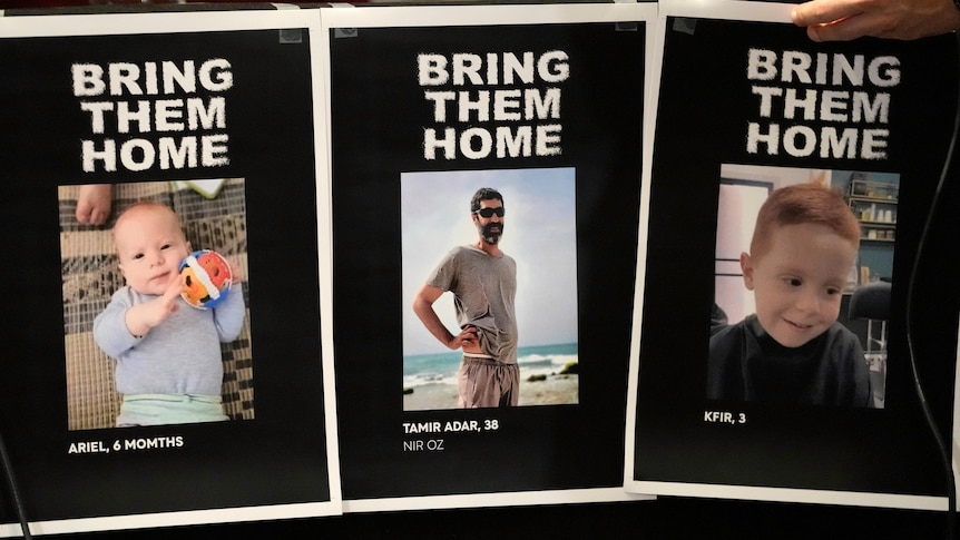 Three posters with photographs of people and the words 'bring them home' Three posters with photographs of people and the words 'bring them home'