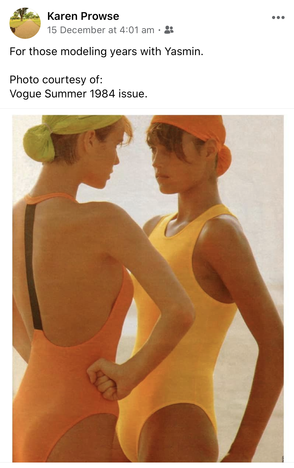 A screenshot of a Facebook post showing two models posing together.