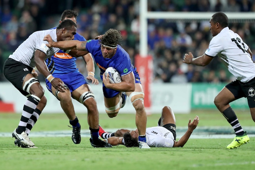 The Western Force's Bernard Stander runs with the ball during the Force's game against Fiji