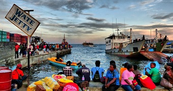 Solomon Islanders wait at the Wate Jetty.