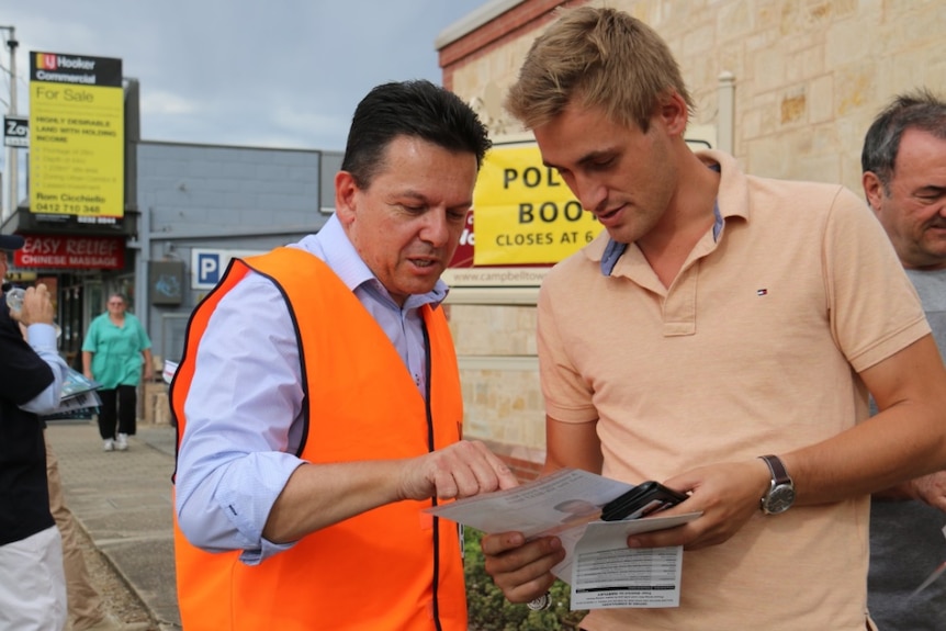 Nick Xenophon talks to a voter.