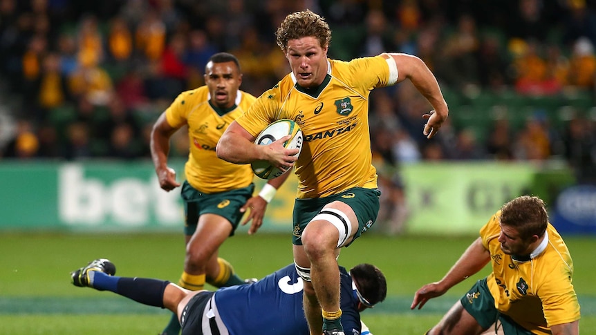 Michael Hooper makes a break against Argentina