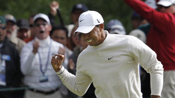 Pumped...Woods came from 6-over to storm into US Open contention.