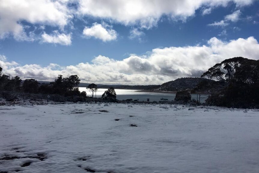 Looking across the snow to great lake in Tasmania's Central Highlands