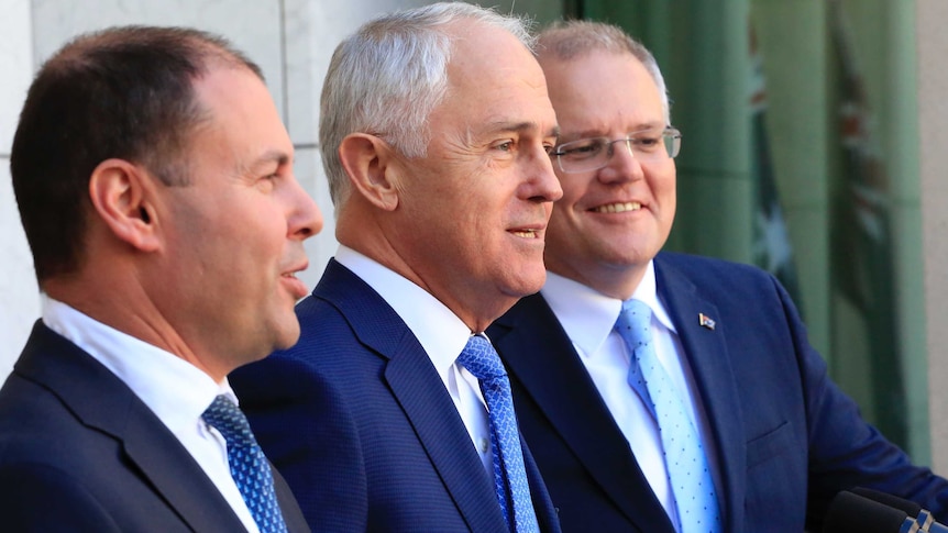 Malcolm Turnbull, Scott Morrison and Josh Frydenberg address the media.