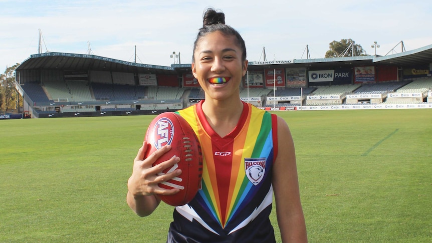 Darcy Vescio wears a rainbow jumper at the VFL Women's pride match at Hamilton in western Victoria.