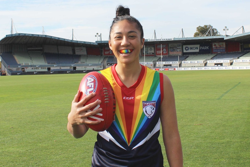 Darcy Vescio wears a rainbow jumper at the VFL Women's pride match at Hamilton in western Victoria.