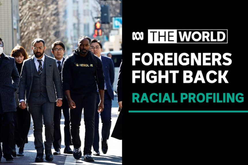 Foreigners Fight Back, Racial Profiling: A group of people walk down a footpath towards the camera.
