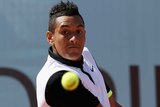 Australia's Nick Kyrgios plays a backhand against Spain's Daniel Gimeno-Traver at the Madrid Open.