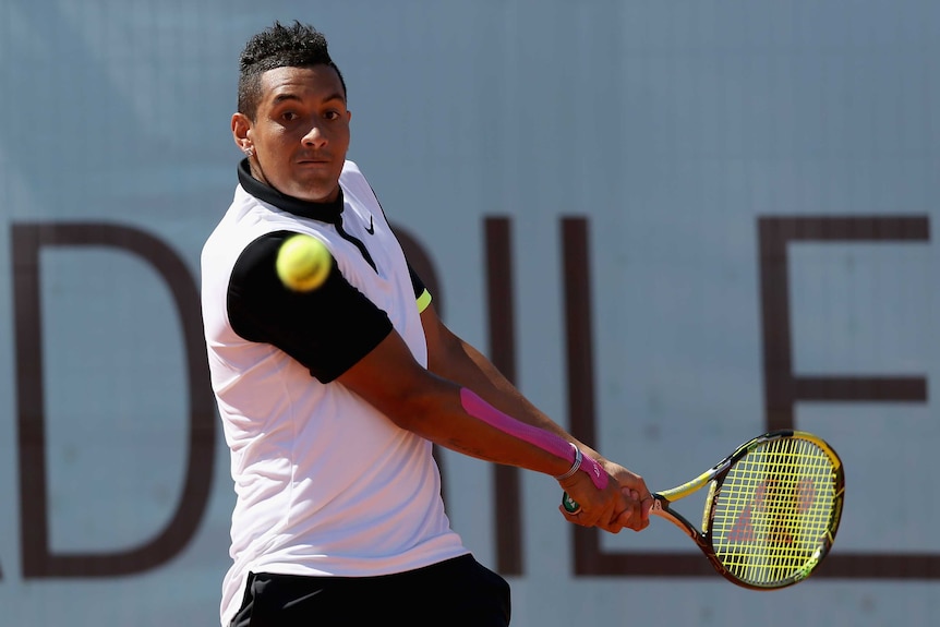 Australia's Nick Kyrgios plays a backhand against Spain's Daniel Gimeno-Traver at the Madrid Open.