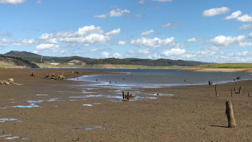 Parts of a river bed are exposed.