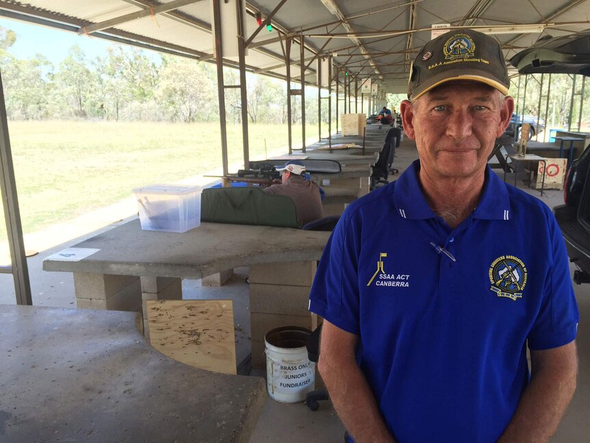 Dave True from the Sporting Shooters Association of the ACT at a shooting range.