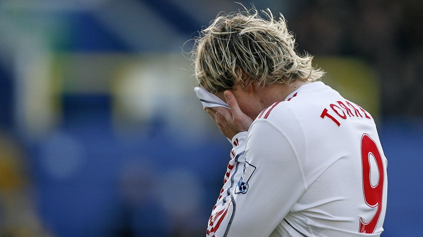 Barren run: Liverpool striker Fernando Torres shows his frustration at Fratton Park.