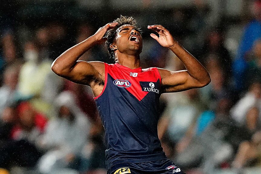 Kysaiah Pickett throws his head back after missing a shot on goal in the AFL match between Melbourne and Fremantle.