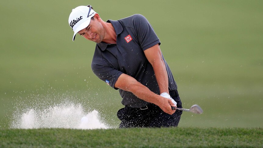 Adam Scott chips out of the bunker at Arnold Palmer Invitational