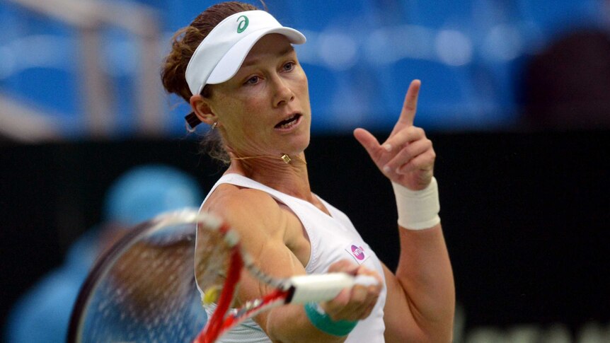 Australia's Samantha Stosur makes a return to Svetlana Kuznetsova.