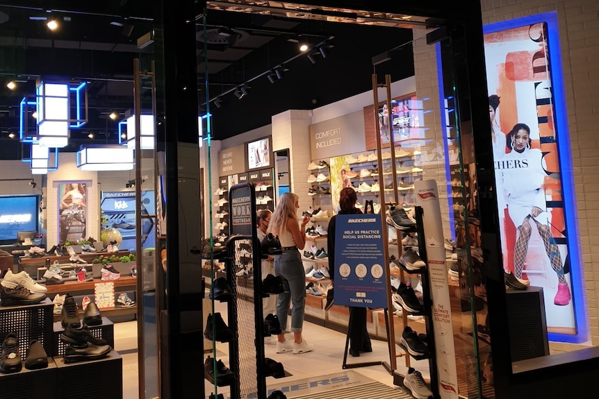 Customers buying shoes at a Skechers stores in the Sydney CBD during lockdown.