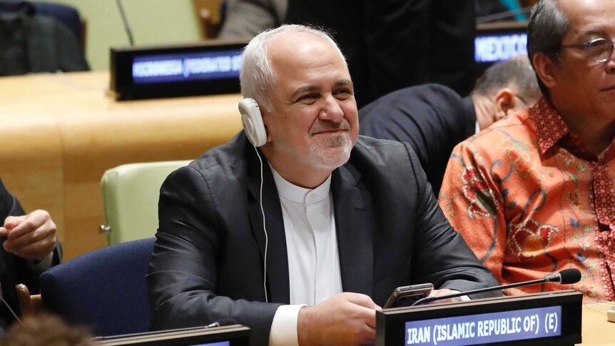 Iran's foreign minister Javad Zarif smiles and he prepares to address the UN.