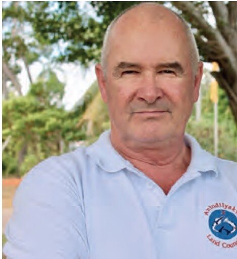 A man looking at the camera with a slight smile.