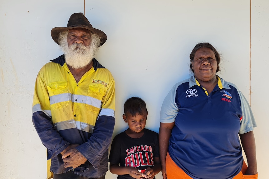 Jackie Mahoney and Pam Corbett with their grandson Nathan in the remote community of Alpururrulam.