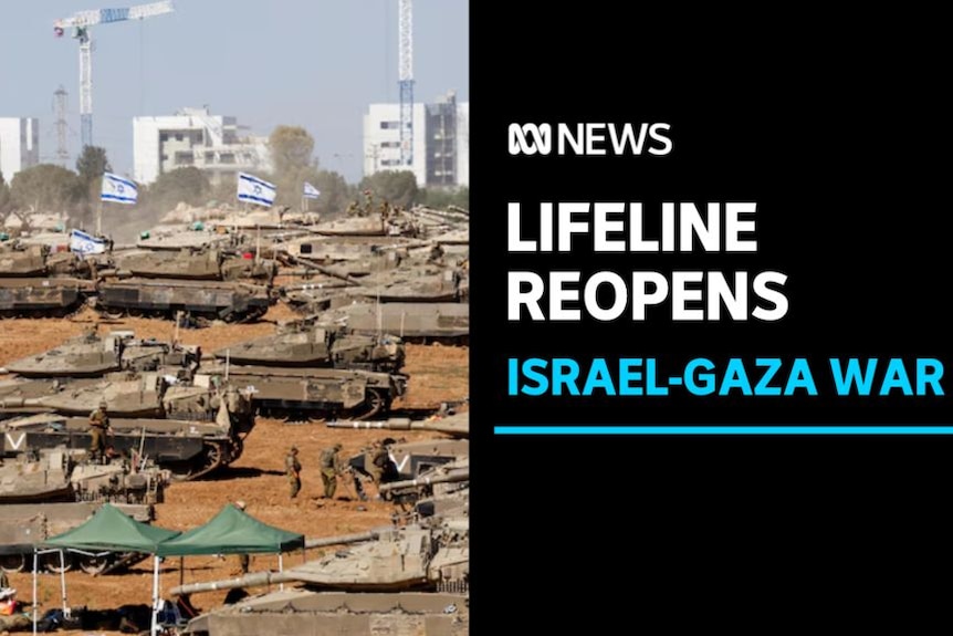 Lifeline Reopens, Israel-Gaza War: Dozens of tanks in a desert landscape with buildings under construction in the background.