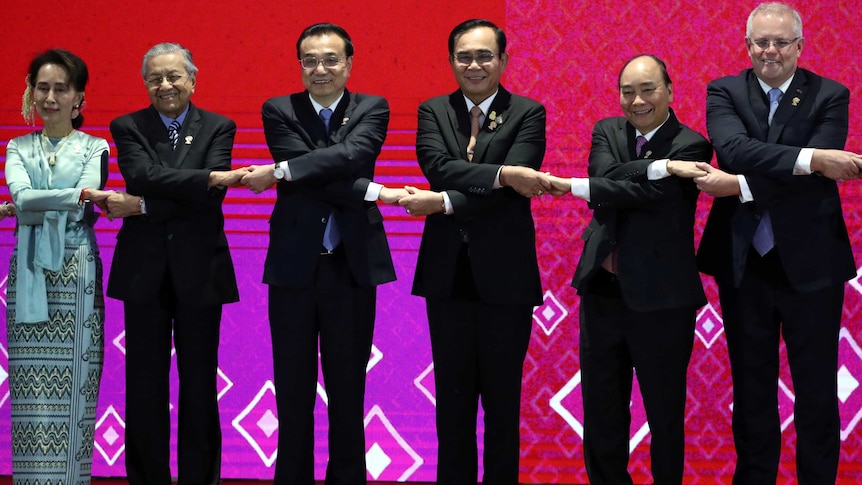 Scott Morrison shakes hands at the East Asia Summit (EAS) in Bangkok, Thailand, November 4, 2019.