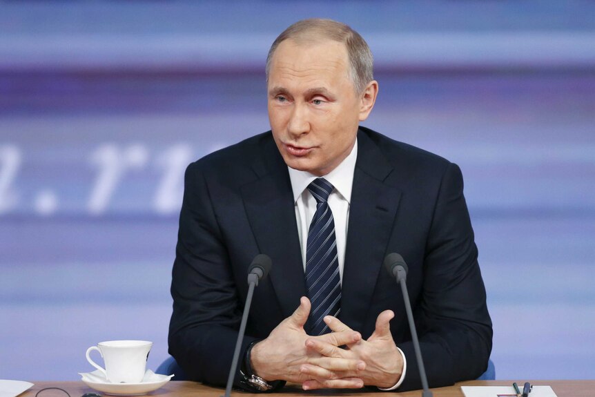 Vladimir Putin speaks during his annual end-of-year news conference in Moscow.