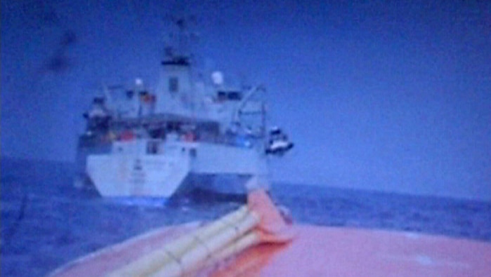 Still of video showing lifeboat being towed