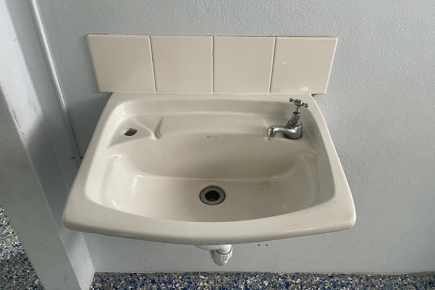 An image showing a sink with an old-fashioned tap fixture