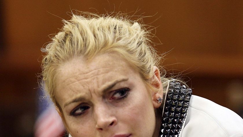 Actress Lindsay Lohan attends a progress report hearing
